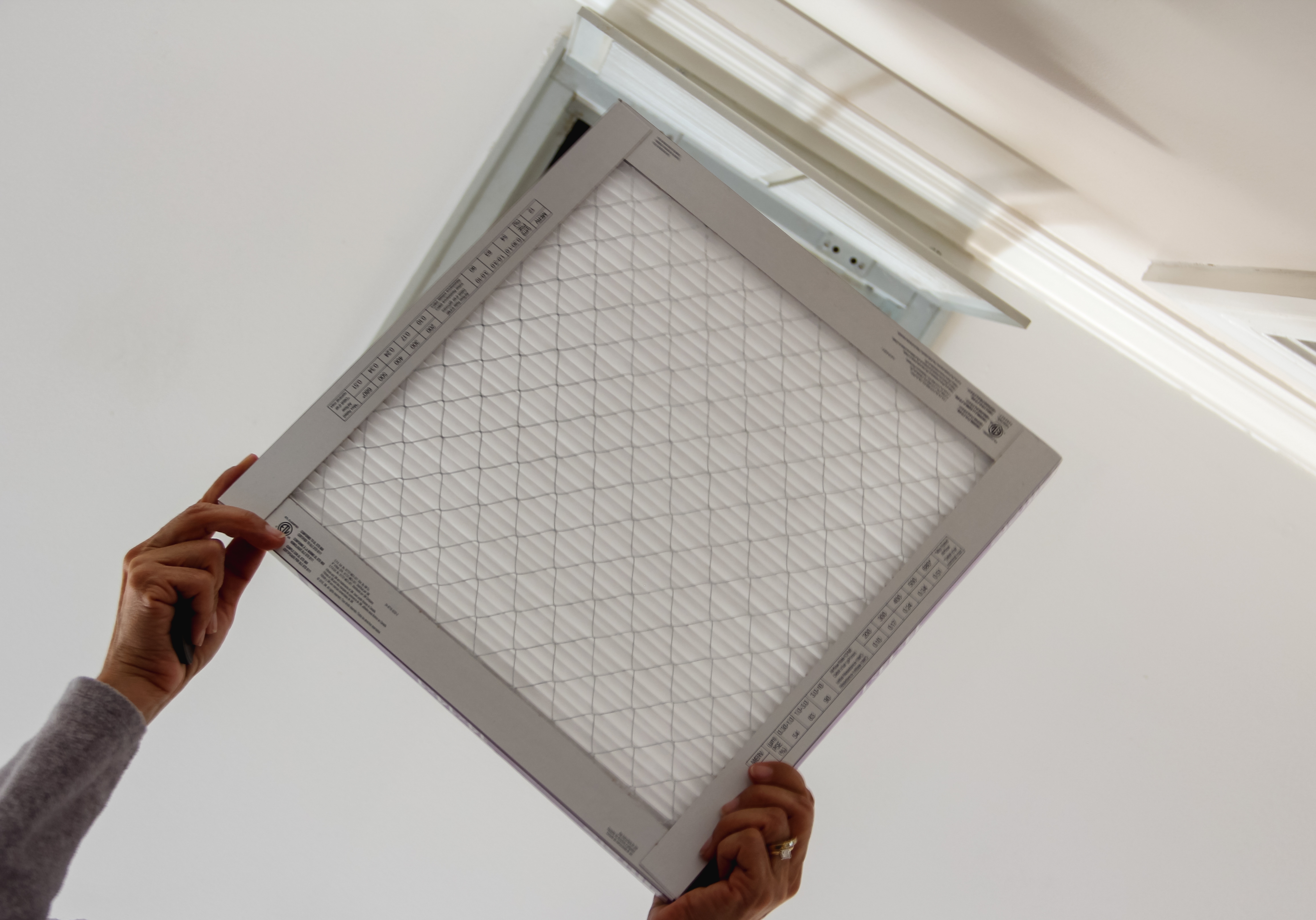 Air filter being installed inside a home